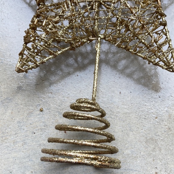 Gold metal star glittered star tree topper on spring. - Picture 4 of 4